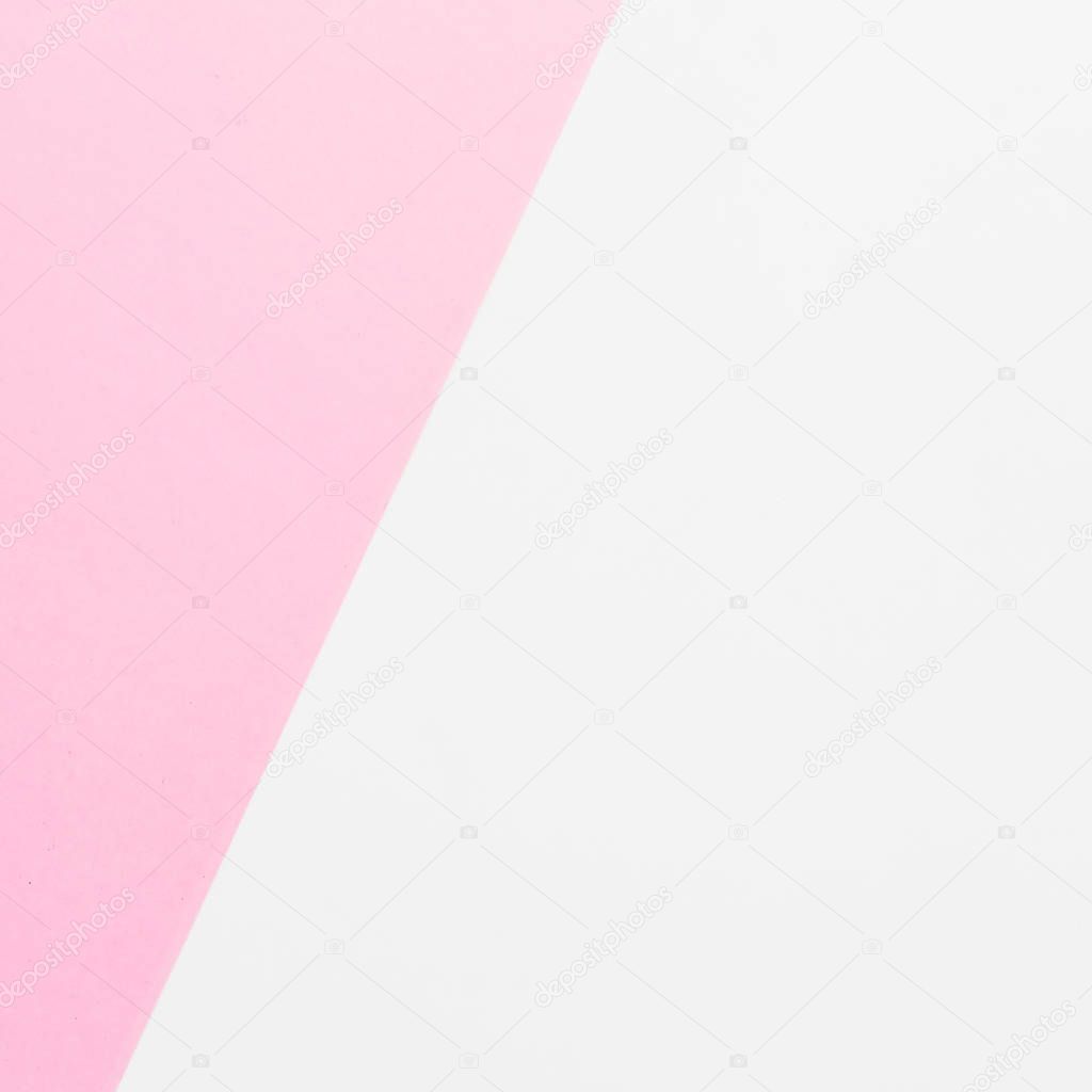 White and pink background. Flat lay. Top view. Colorful texture