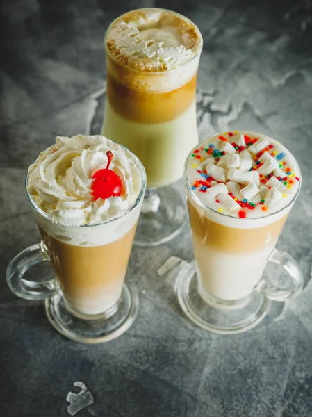 Milkshake drinks with whipped cream, close up