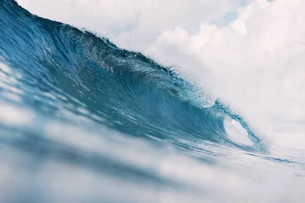 Ocean barrel wave in ocean. Breaking wave for surfing in Tahiti