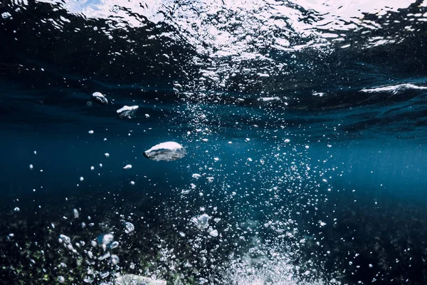 Underwater sea with air bubbles. Ocean in underwater