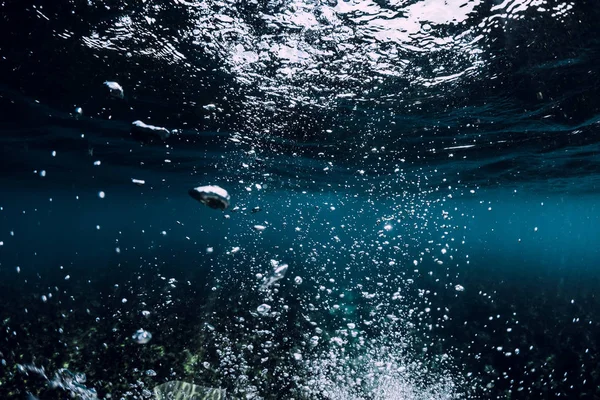 Underwater sea with air bubbles. Ocean in underwater