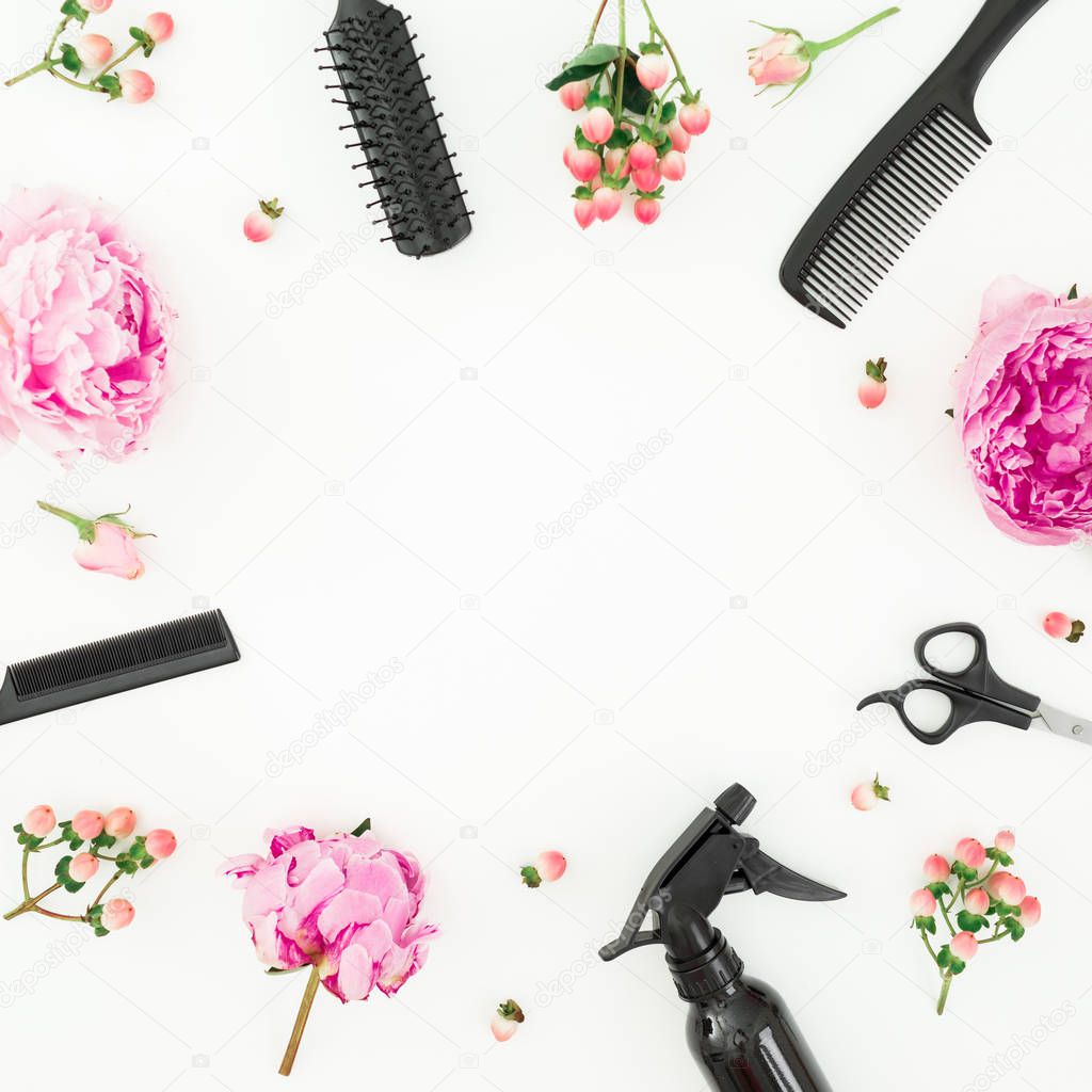 Hairdresser concept with spray, scissors and peonies flowers on white background. Flat lay, top view