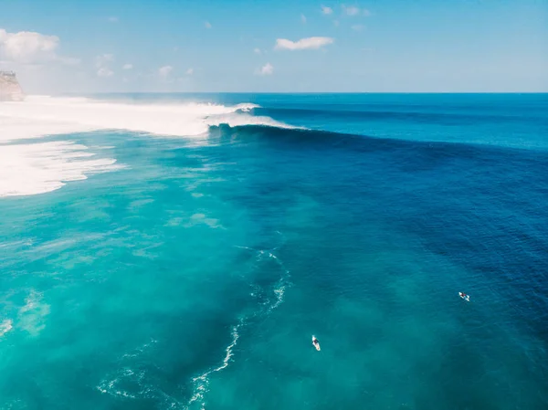 Aerial view of big wave surfing in Bali. Big waves in ocean