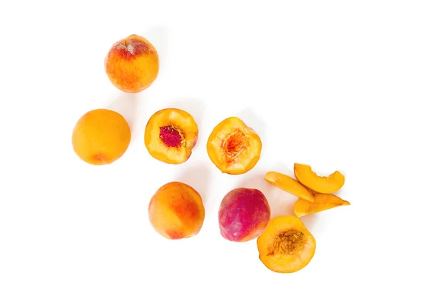 Ripe peaches isolated on white background. Copy space. Top view. — Stock Photo, Image