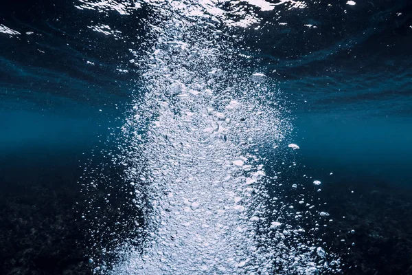 Air bubbles in underwater. Ocean in underwater