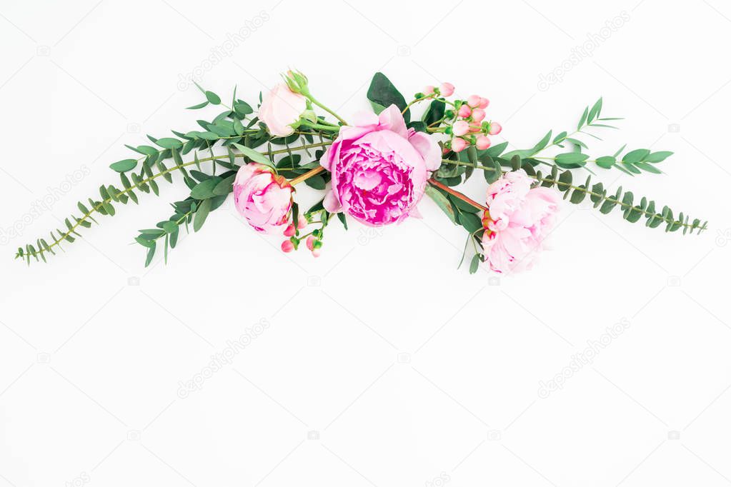 Floral composition with pink flowers and eucalyptus on white bac