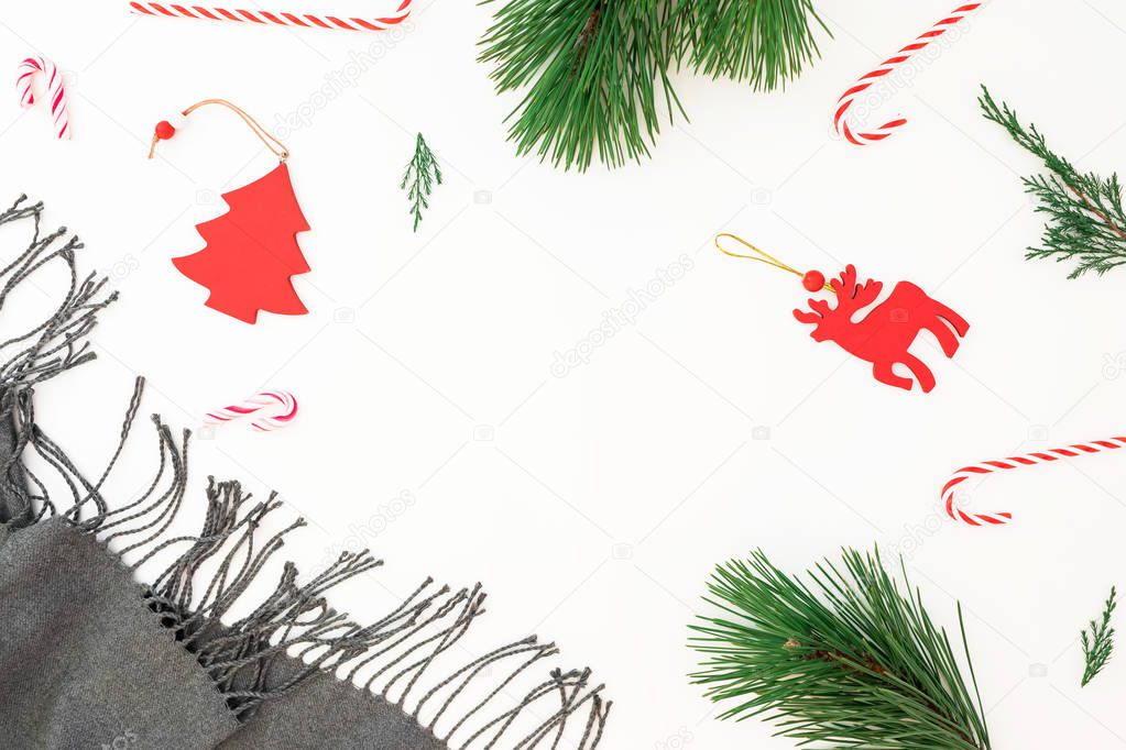 Christmas frame concept. Christmas decorations, scarf, pine bran
