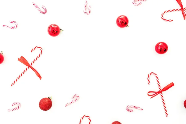 Christmas composition with red decoration and candy cane isolate — Stock Photo, Image