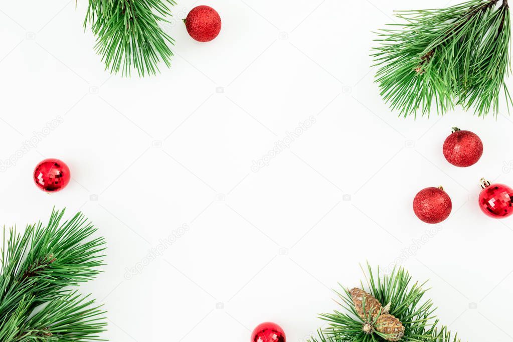 Christmas frame of evergreen tree branches and balls decoration 