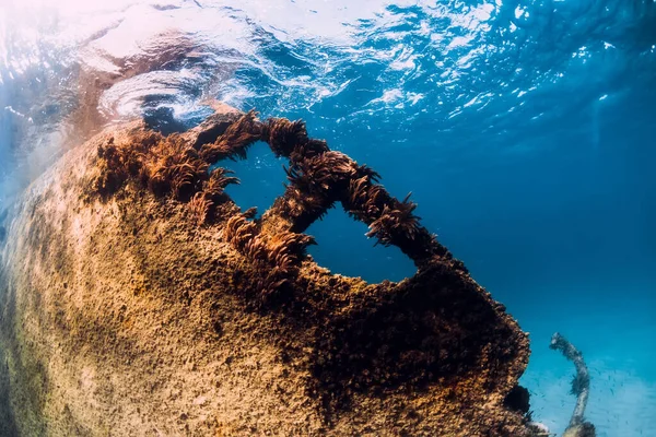 Wreckship at sand bottom underwater in blue ocean near Arrecife, Lanzarote island