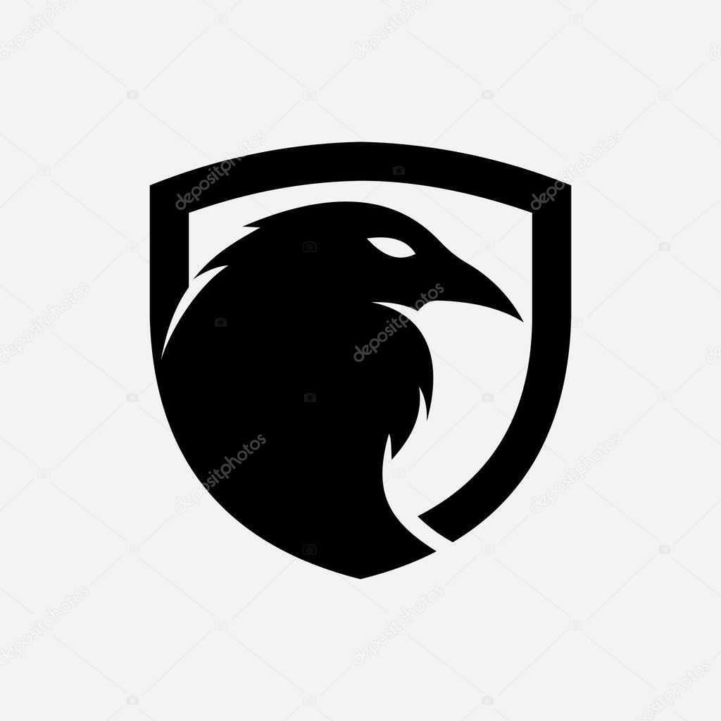 Raven in shield logo template