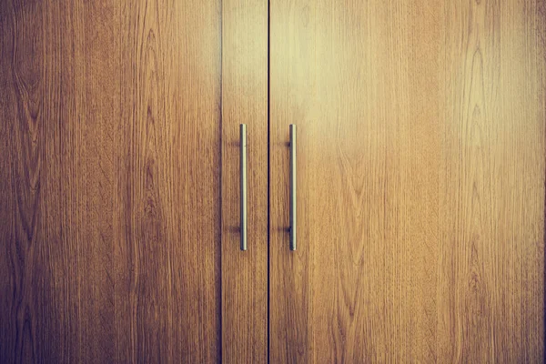 Close up di una porta chiusa in legno marrone design sfondo texture vintage interno — Foto Stock