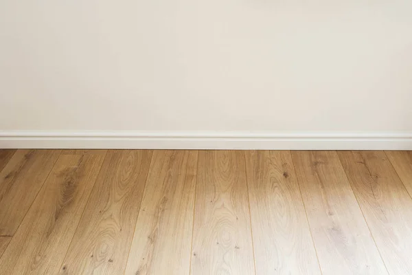 Empty room with white wall and PVC floor