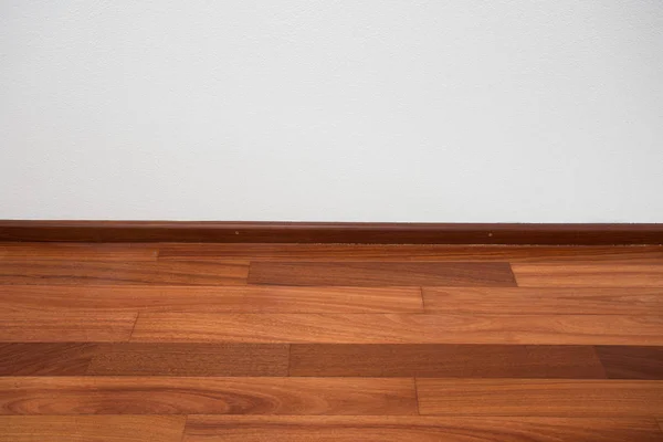 Camera vuota con parete bianca e pavimento in PVC — Foto Stock