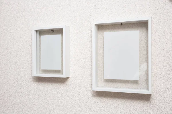 Two blank frame on white wall clean modern design