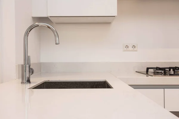 Luxurious modern kitchen with sink, Contemporary kitchen unit with chromed water tap modern white clean concept — Stock Photo, Image