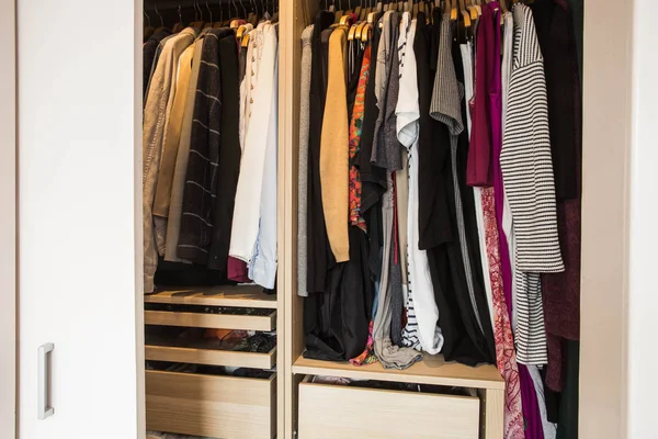 Wardrobe with messy clothes, closeup, fashion design — Stock Photo, Image