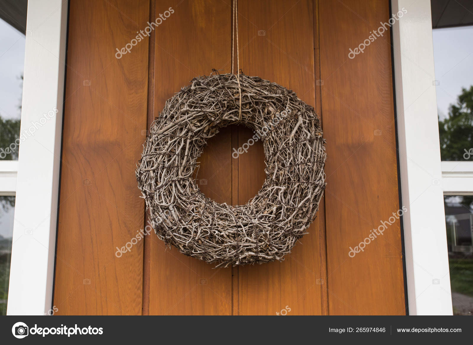 Closeup Of Front Door And Decorative Wreath Stock Photo