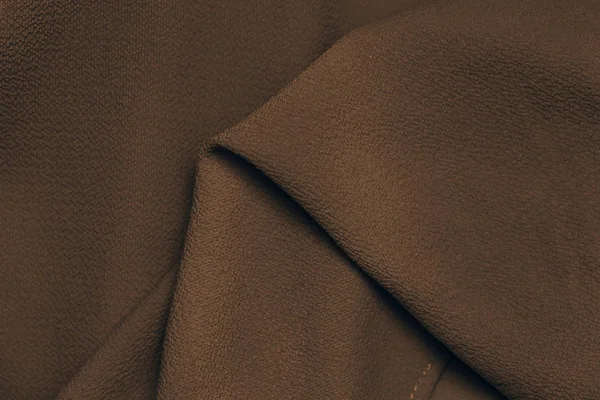 Dark brown fabric silk texture background close-up — Stock Photo, Image