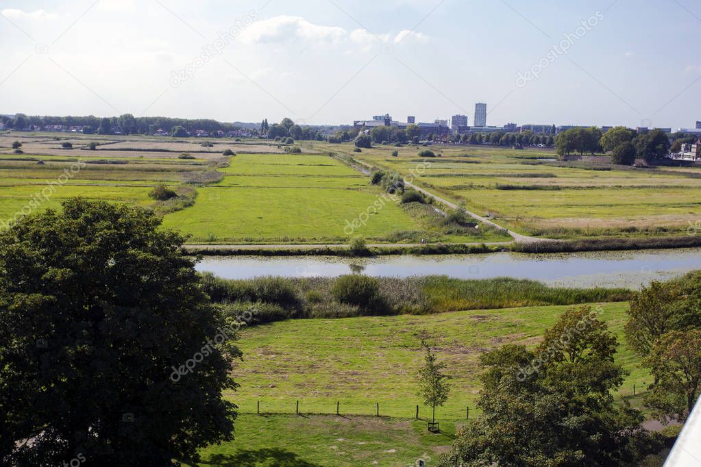 View of nature reserve Bossche Broek close to the city center of Den Bosch. Green nature landscape