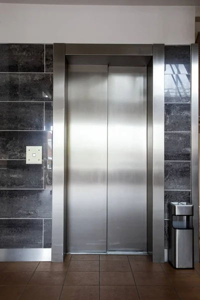 Building Elevator with closed door in apartment complex luxury