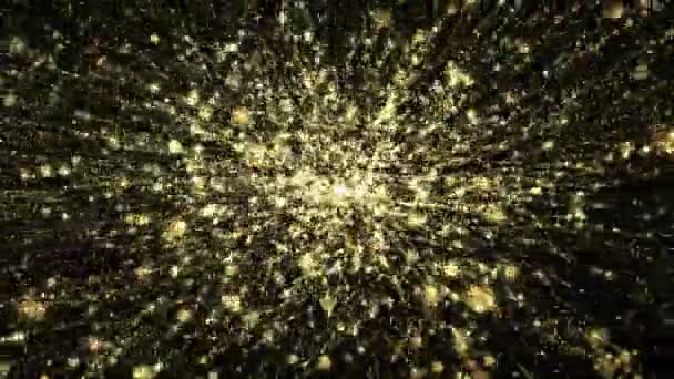 暗い背景に飛んでいる光沢のある金粒子スパーク — ストック動画
