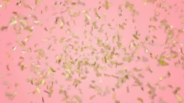 Золота Конфетті Падає Пастельно Рожевий Фон Знімок Зеленого Екрана — стокове відео