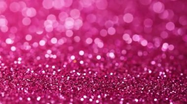 Mor glitter doku döner. Parlak arka plan.