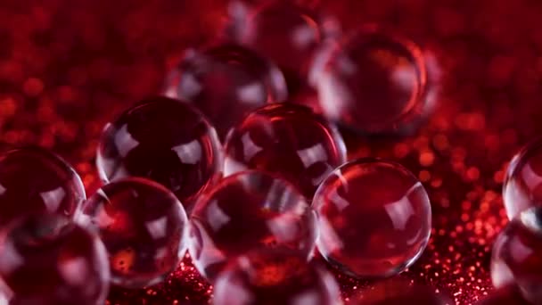 Crystal Gel Palle Acqua Sulla Rotazione Texture Glitter Rosso Macro — Video Stock