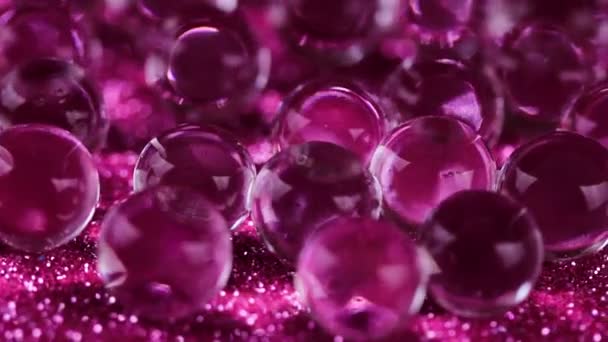 Bolas Agua Crystal Gel Rotación Textura Brillo Rosa Primer Plano — Vídeo de stock