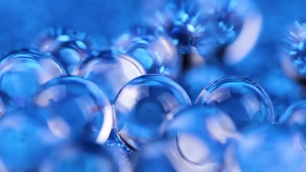 Crystal Gel Water Ballen Blauwe Glitter Textuur Rotatie Close Macro — Stockvideo