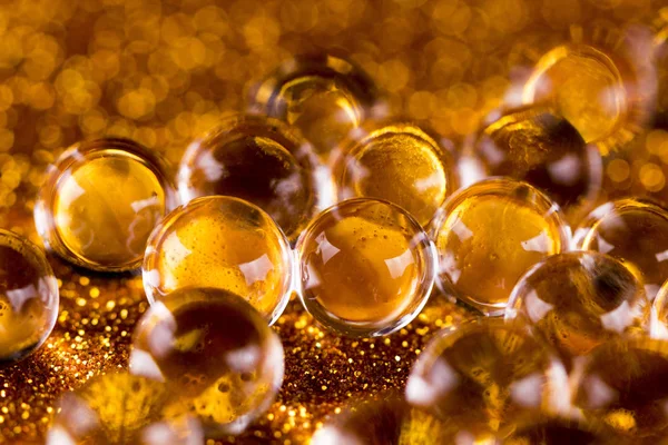 Crystal Gel Water Ballen Goud Glitter Textuur Rotatie Close Macro — Stockfoto