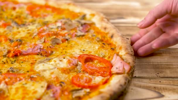 Hand Takes Piece Delicious Pizza Wooden Surface Close — Stock Video