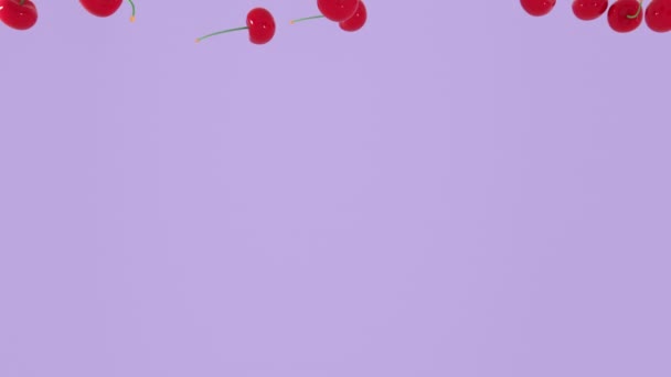 Abstract Renderizado Cereza Roja Cayendo Sobre Diferentes Fondos Pastel Animación — Vídeos de Stock