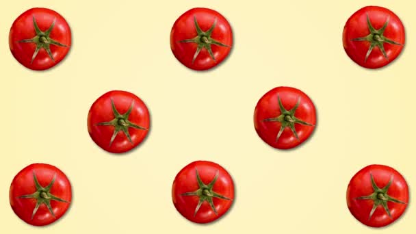Abstrakt färganimering av tomater på Pastellgul bakgrund. 4K sömlös Loo — Stockvideo