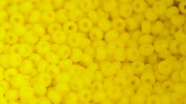 Close Yellow Beads Rotating Cmacro Footage — Stock Video