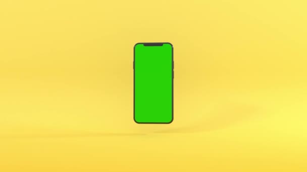 スマートフォンの3Dレンダリングが上下に回転します 商用利用のための新しい携帯電話の緑の画面 4Kシームレスループアニメーション — ストック動画