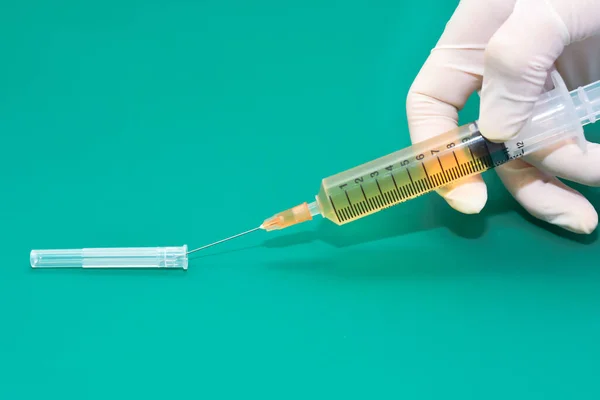Syringe and needle for venipuncture.
