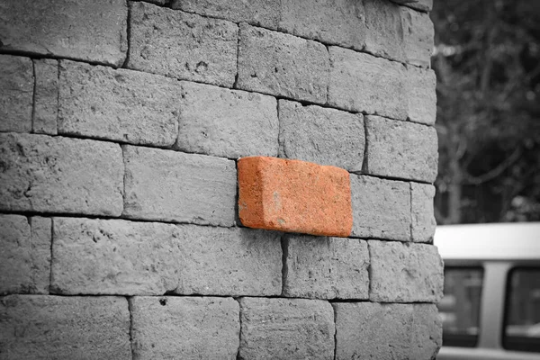 Gri tonlu tuğla duvar dokusu arkaplanındaki tuğla duvarın rengi