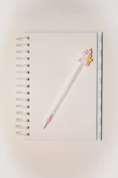 An open notebook for notes on a white background. Free space for text.Top view. Flat lay.