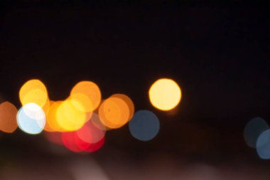 Soyut arkaplan gece Bokeh ışığını bulanıklaştırdı