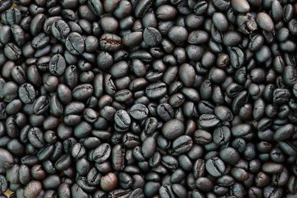 Mörka Rostade Kaffebönor Bakgrund — Stockfoto