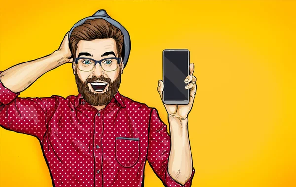 Attractive smiling hipster in specs with phone in the hand in comic style. Pop art man in hat holding smartphone. Digital advertisement male model showing the message or new app on cellphone. — Stock Image Attractive Smiling Hipster Specs Phone Hand Comic Style Pop Art Stock Picture