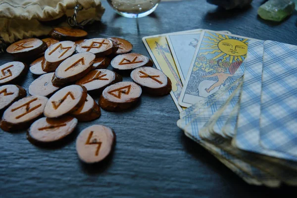 Wooden runes from the Tarot card on the table — Stock Photo, Image