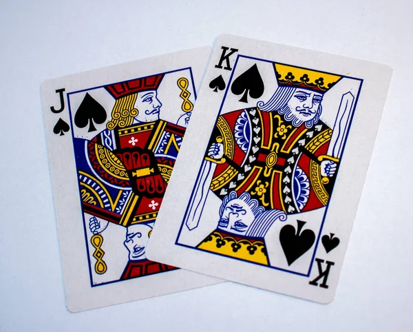 Playing cards. King and Jack of spades.