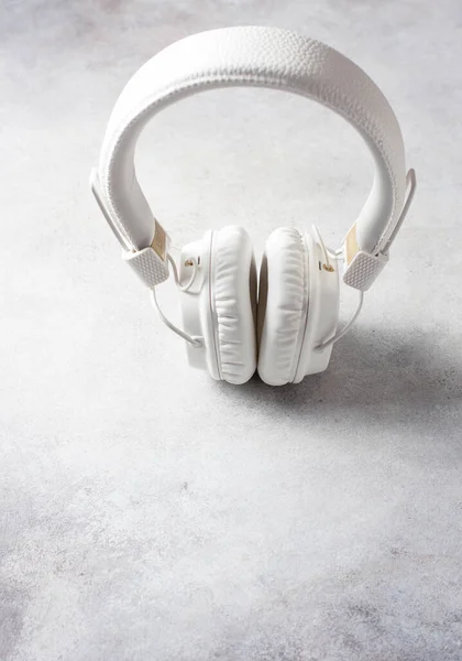 White headphones on white background. Macro
