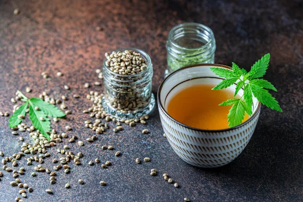 Top view Hemp Tea. Cannabis herbal tea. Selective focus, copy space.