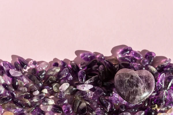 Crystal minerals for meditation on pink background. Magic Rock for Healing stones.