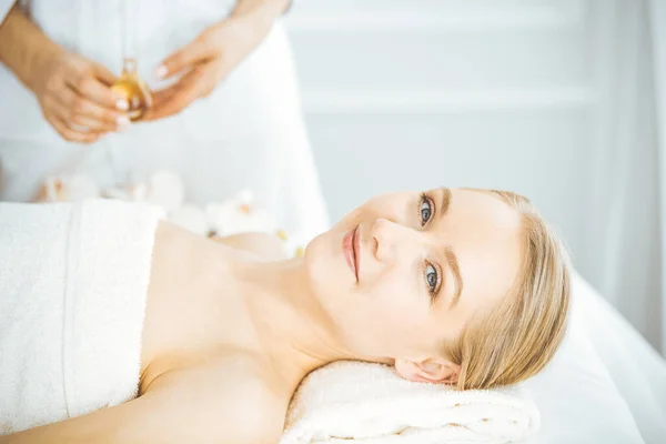 Happy beautiful woman smiles before spa procedures getting. Beauty and joy concept — Stock Photo, Image