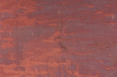 Soyut metal doku arka planı. Paslı eski yüzey ve kırmızı çamurlu